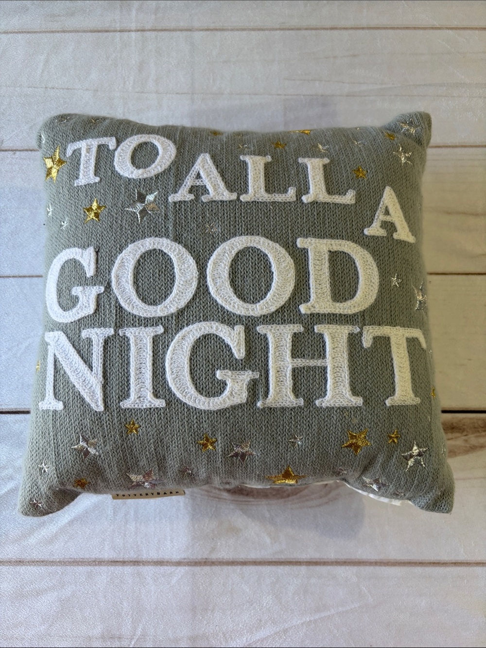 Pottery Barn Gray Holiday Pillow with White Lettering and Metallic Stars